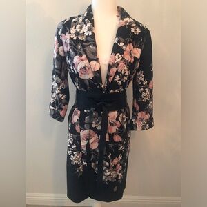 New! Artizan Floral Black Duster. Has pockets is lightweight and versatile.